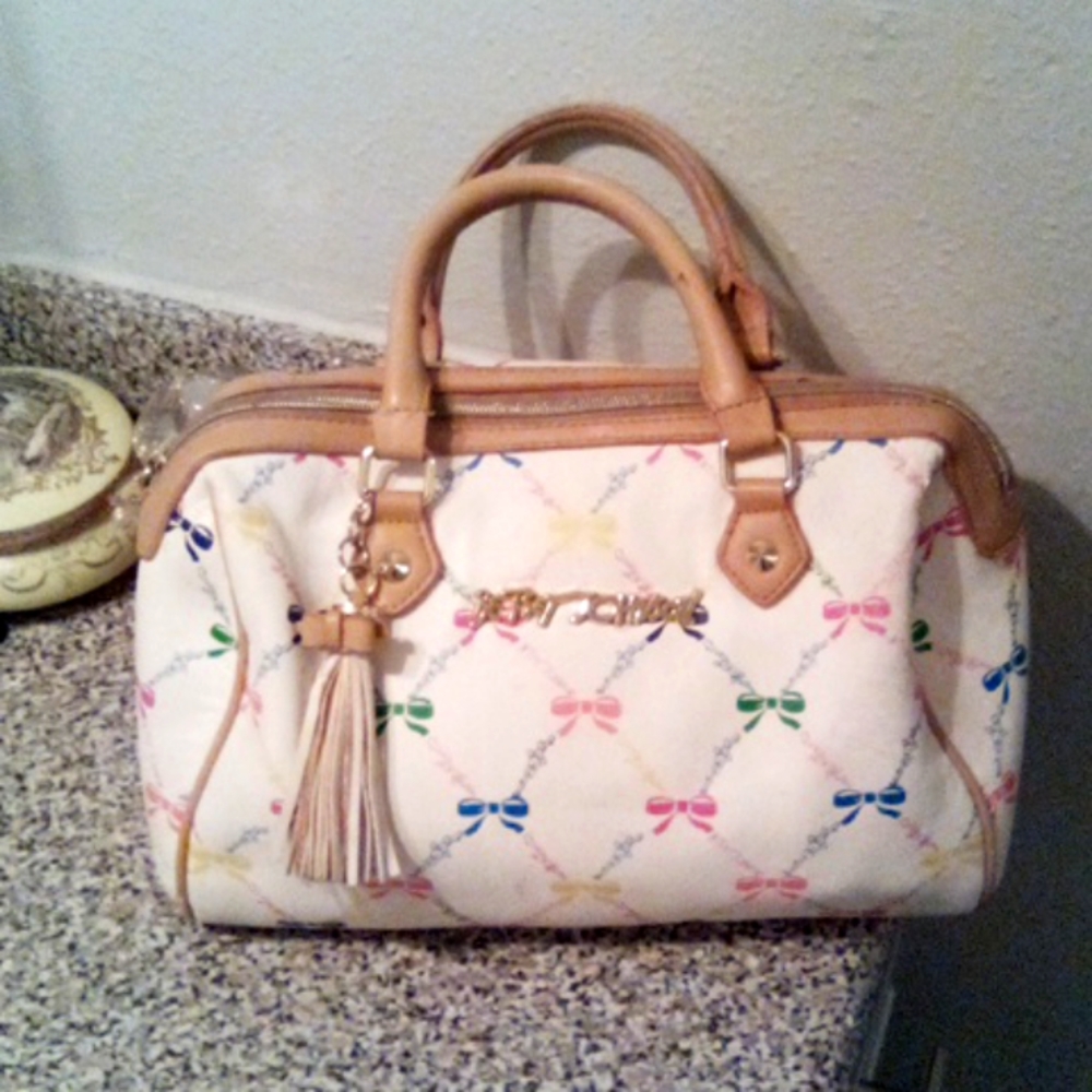 Betsey Johnson speedy. White with multicolored pattern